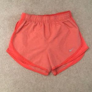 Orange Nike shorts